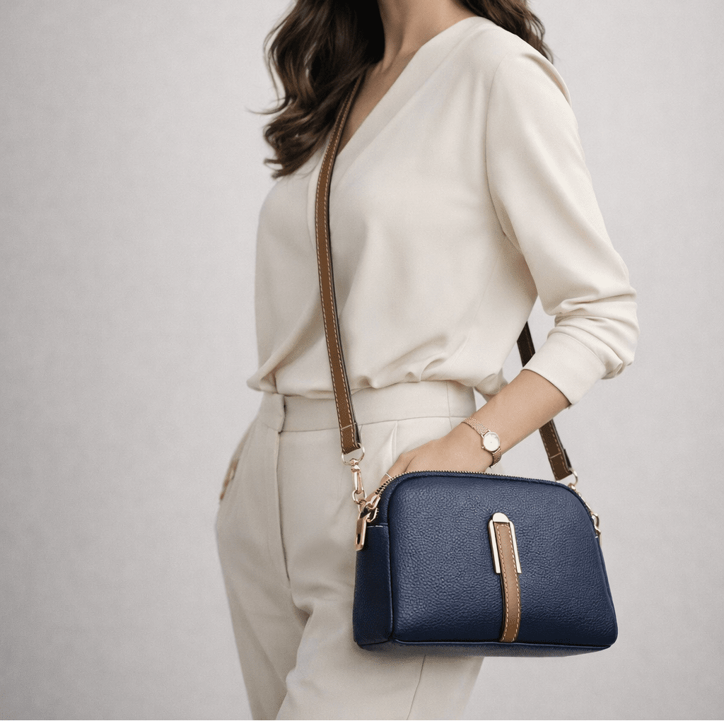 Mujer con el bolso bandolera Emanuela azul noche cruzado