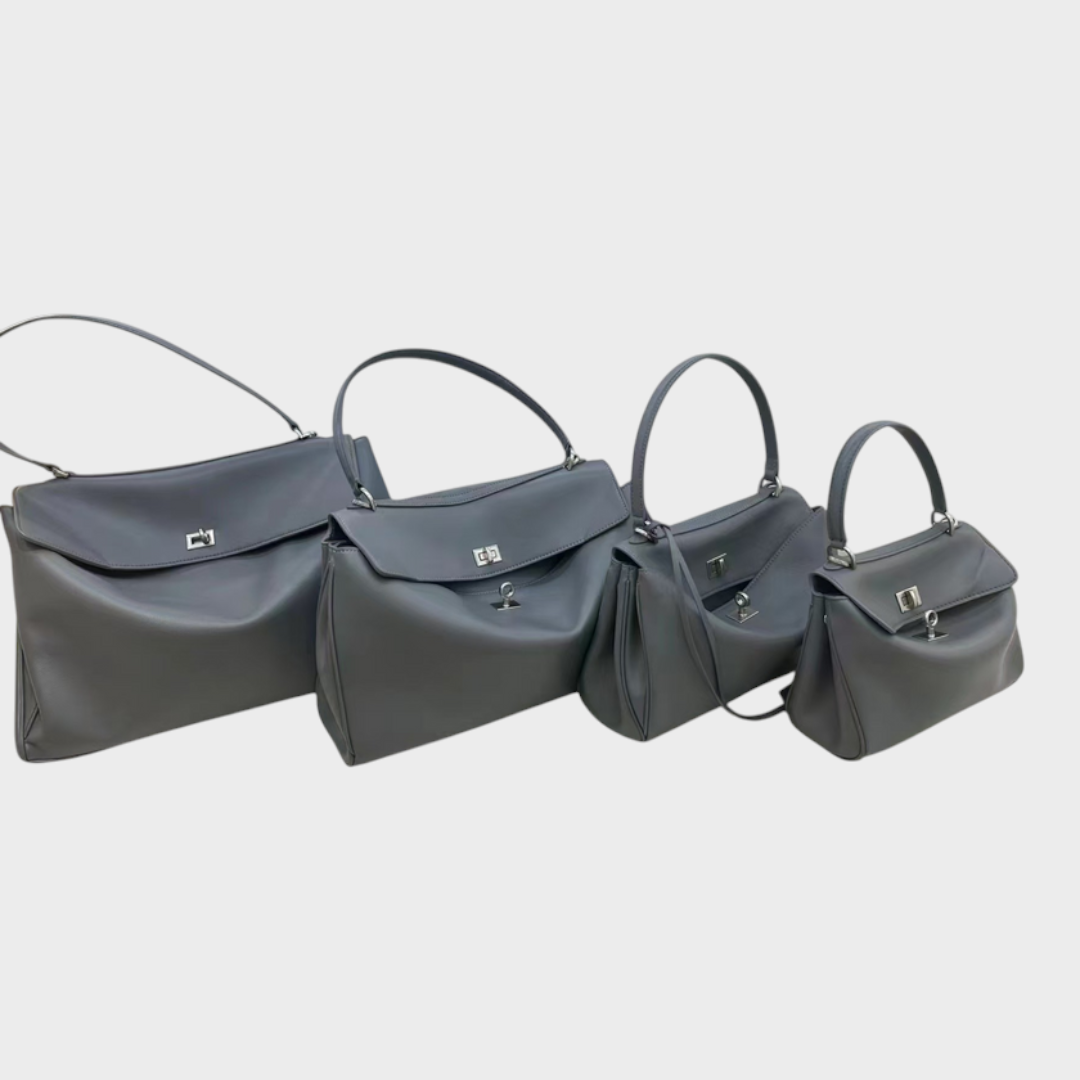 Lidia bolso de piel minimalista gris con hebilla plateada