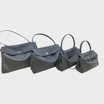 Lidia bolso de piel minimalista gris con hebilla plateada