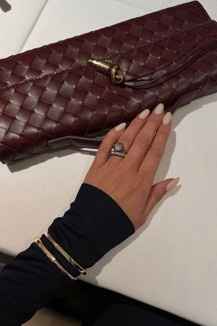 Melania - Bolso Clutch con Nudo Dorado